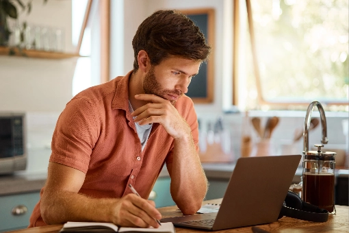 Man with laptop Man with laptop | Keystone Carpets and Interiors