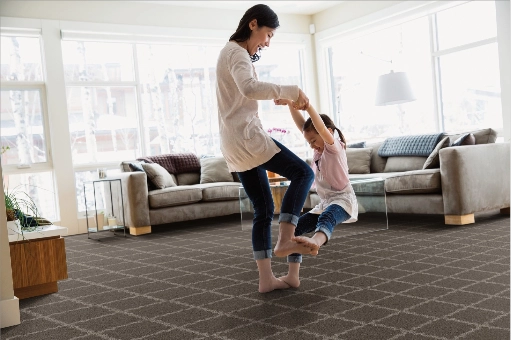 Choosing-Flooring Lady playing with girl | Keystone Carpets and Interiors