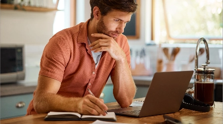 blog Man with laptop | Keystone Carpets and Interiors